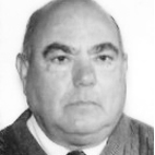 Retrato a preto e branco de um homem de fato e gravata, fotografado de frente. A imagem não contém texto visível que permita identificá-lo.
