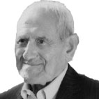Retrato a preto e branco de um homem idoso, de fato e gravata, sobre fundo claro. Não há texto visível que permita identificá-lo.