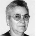 Retrato a preto e branco de uma pessoa com cabelo curto e óculos, sobre fundo claro. A imagem não contém texto visível que permita identificá-la.