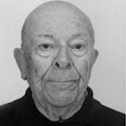 Retrato a preto e branco de um homem idoso, de frente, sobre um fundo liso. Não há texto visível que permita identificá-lo.