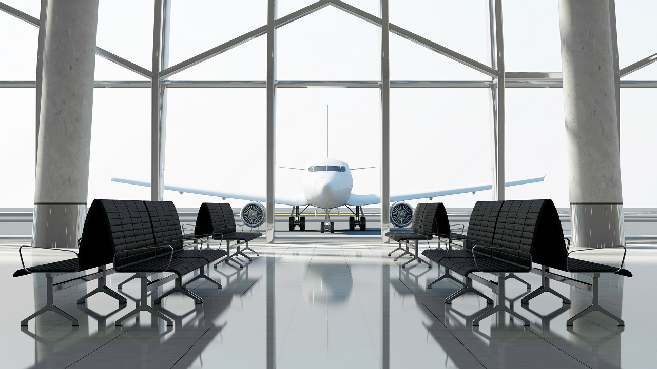 imagem de um avião de passageiros captada a partir de um terminal