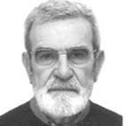 Retrato a preto e branco de um homem com óculos, cabelo grisalho e barba branca. O fundo é claro e não há texto visível que permita identificá-lo.