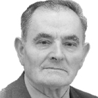 Retrato a preto e branco de um homem de cabelo curto, vestido com casaco e gravata, sobre fundo claro. Não há texto visível que permita identificá-lo.