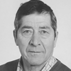 Retrato a preto e branco de um homem de meia-idade, fotografado de frente. Não há texto visível que permita identificá-lo.