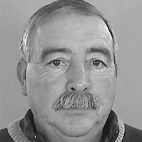 Retrato a preto e branco de um homem de meia-idade, com bigode, a olhar para a câmara. Não há texto visível que permita identificá-lo.