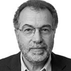 Retrato a preto e branco de um homem com óculos, barba e casaco escuro, sobre fundo claro. A imagem não contém texto visível que permita identificá-lo.
