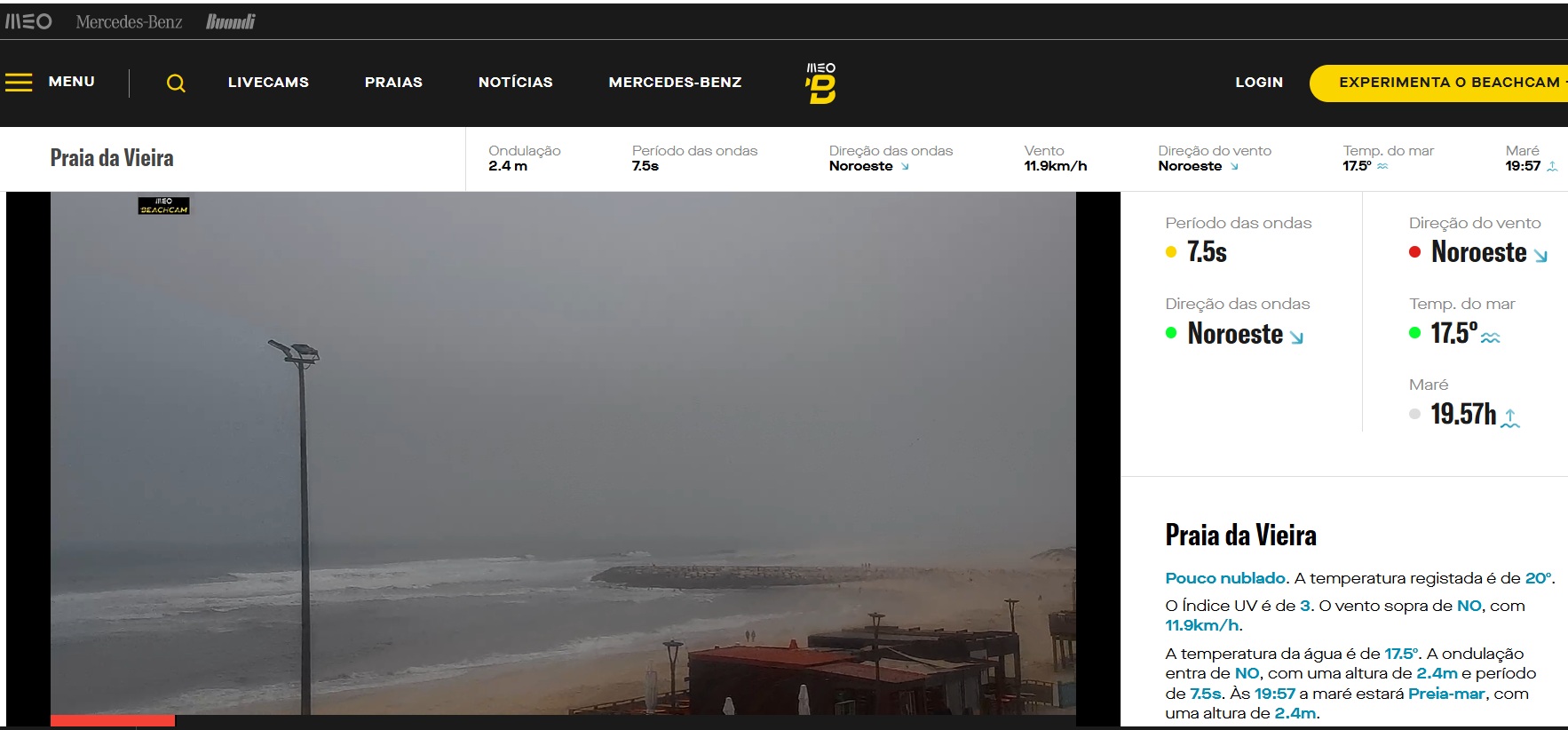 Captura de uma página de webcam da Praia da Vieira, com vista para o areal, o mar e a ondulação. A página apresenta dados sobre vento, temperatura da água e maré.